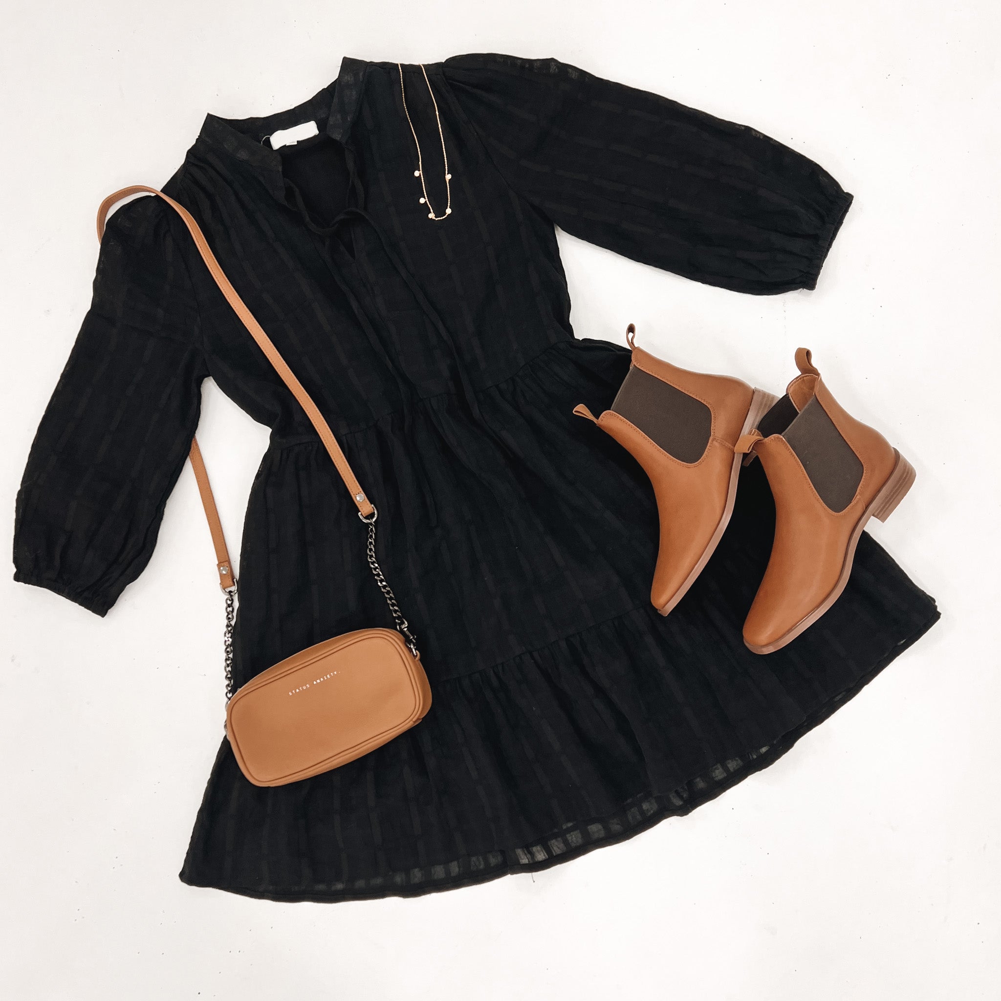 The 'Amarie Mini Dress Black' has you covered!